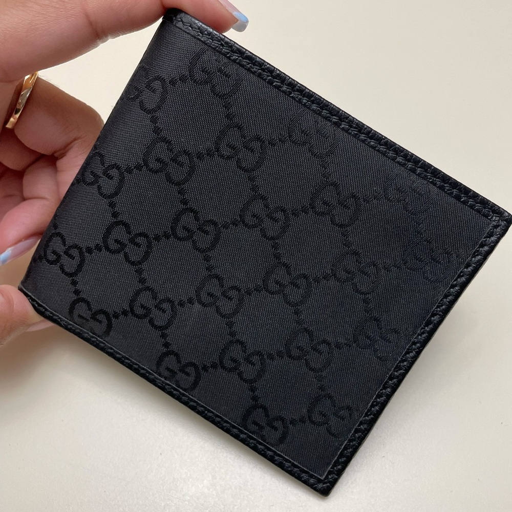 Gucci men's GG canvas wallet